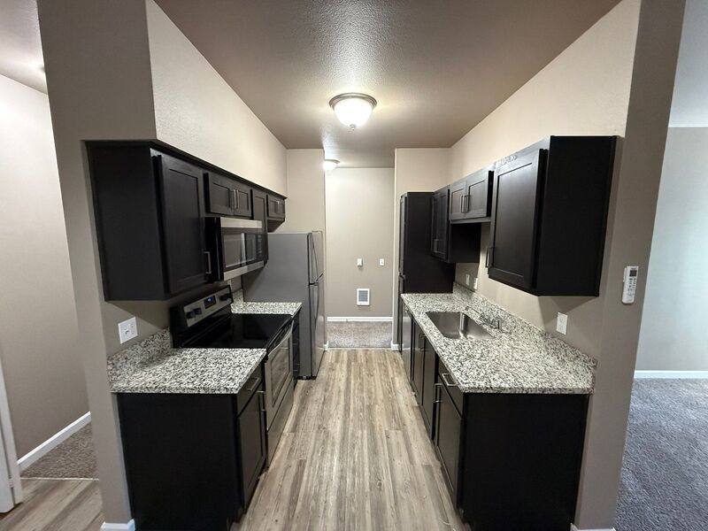 $1,690 First 3 Months, NE Newer Community 3 Bed, 2 Bath 2nd Floor Apartment, Deck and AC, AVAILABLE NOW! property image