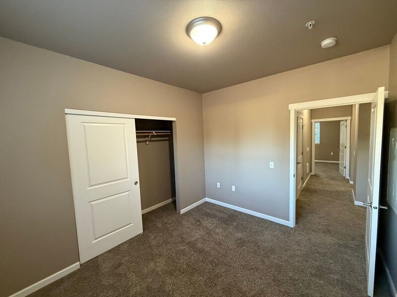 $1,690 First 3 Months, NE Newer Community 3 Bed, 2 Bath 2nd Floor Apartment, Deck and AC, AVAILABLE NOW! property image