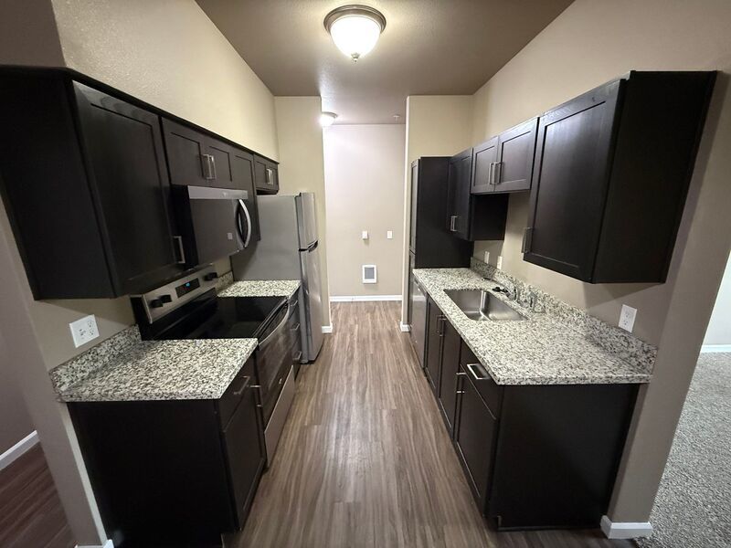 $1,690 First 3 Months, NE Newer Community 3 Bed, 2 Bath 1st Floor Apartment, Deck and AC, AVAILABLE NOW! property image