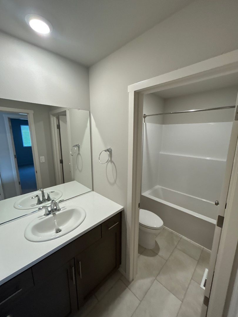 Spacious 4-Bed, 2.5-Bath 2-Story Home in Woodburn HOA Community — AVAILABLE NOW! property image