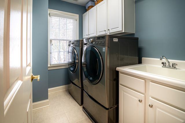 laundry room with washer and dryer