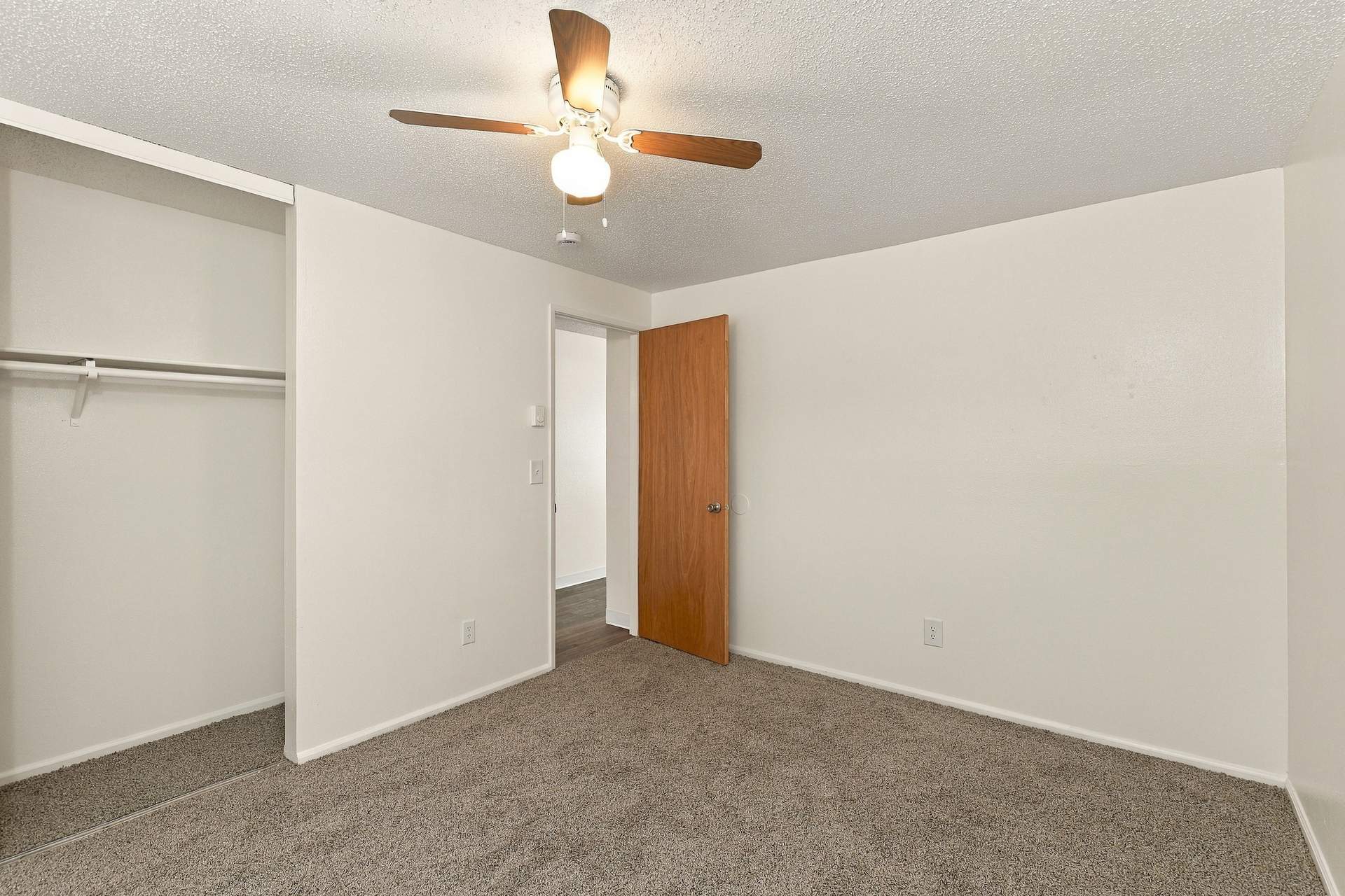 Villa Caprice bedroom with ceiling fan